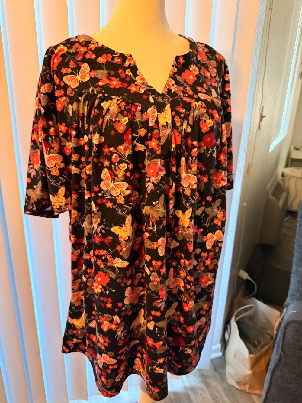 Comfortable, stretchy, pink butterfly blouse